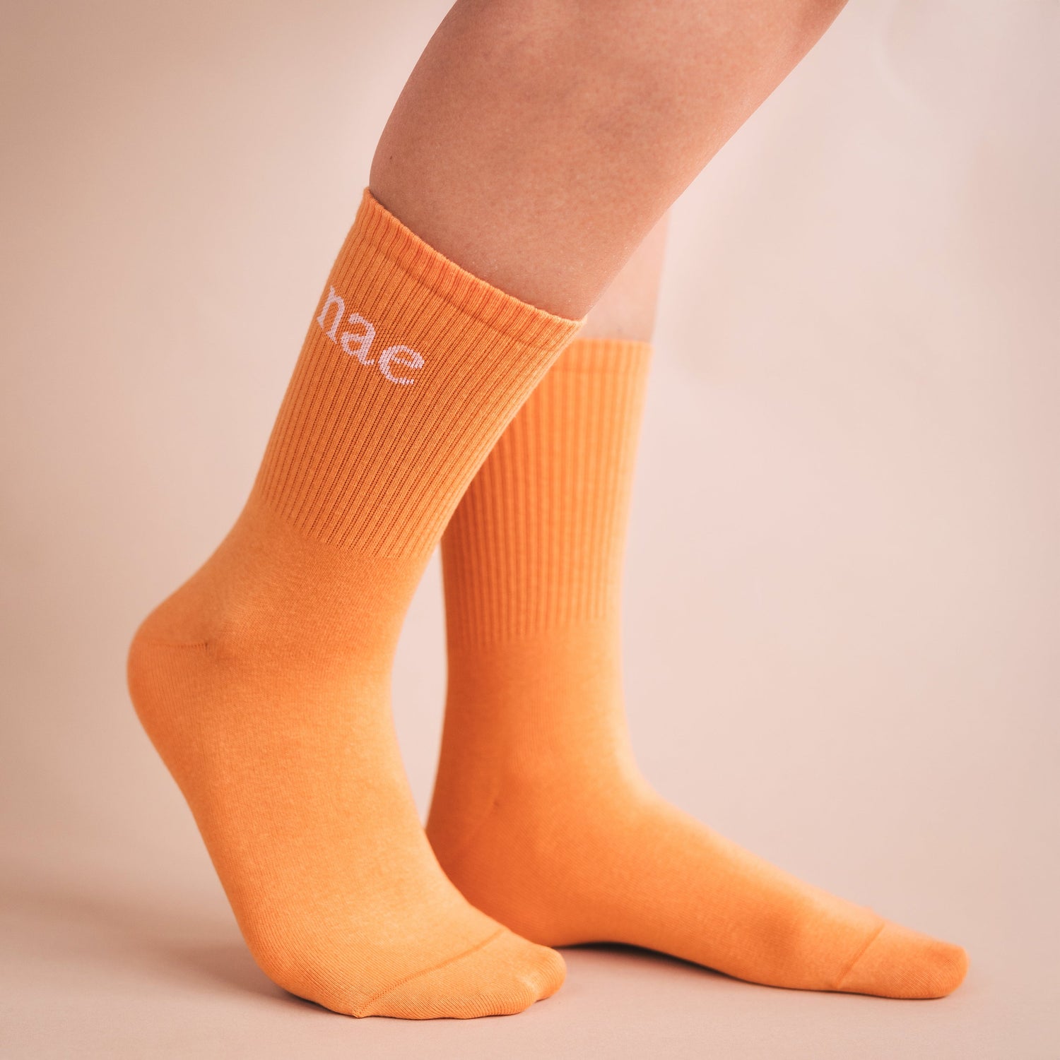 orange socks animal friendly NAE