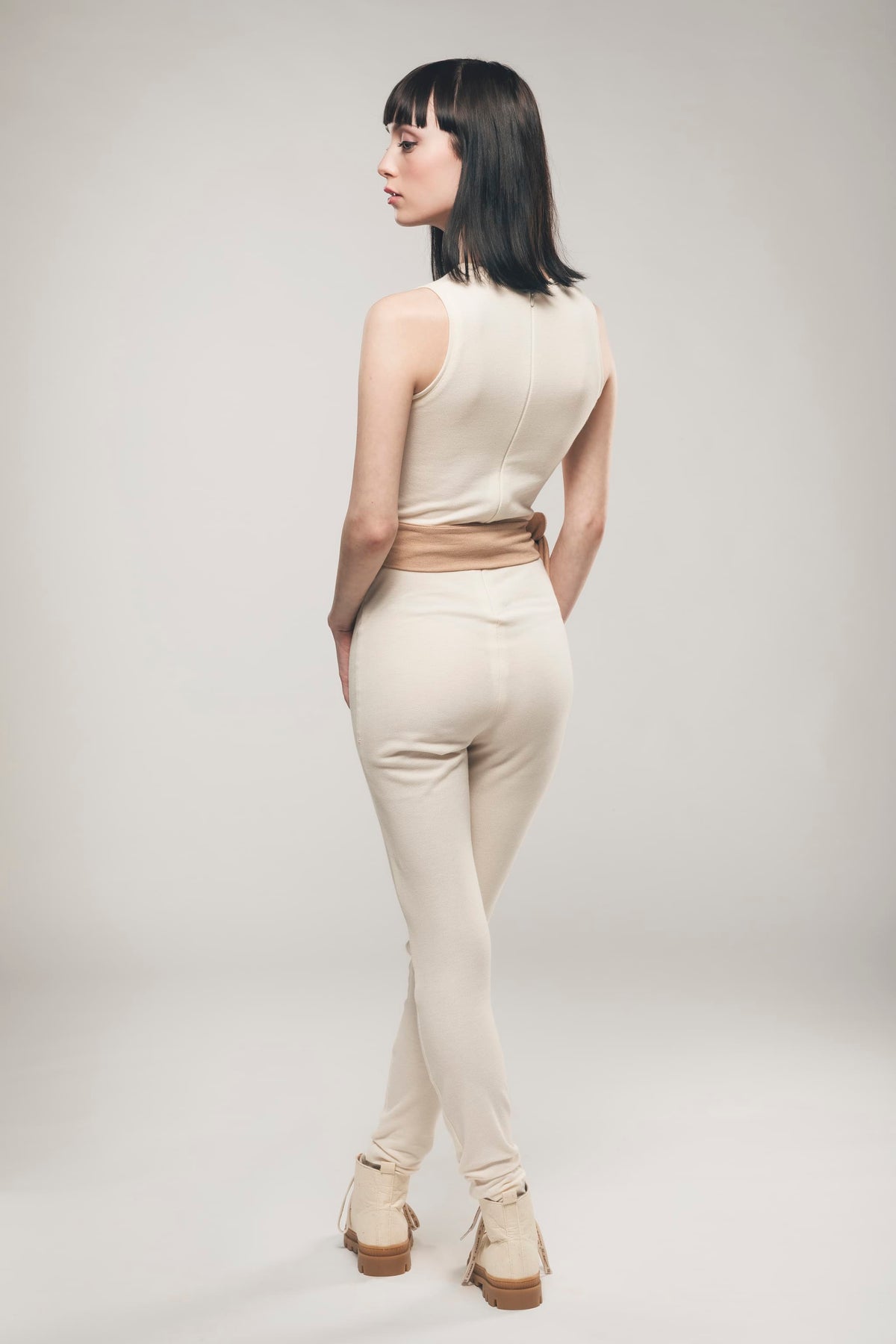 Bellamy ecru cotton piqué jumpsuit with contrast waist tie – back view