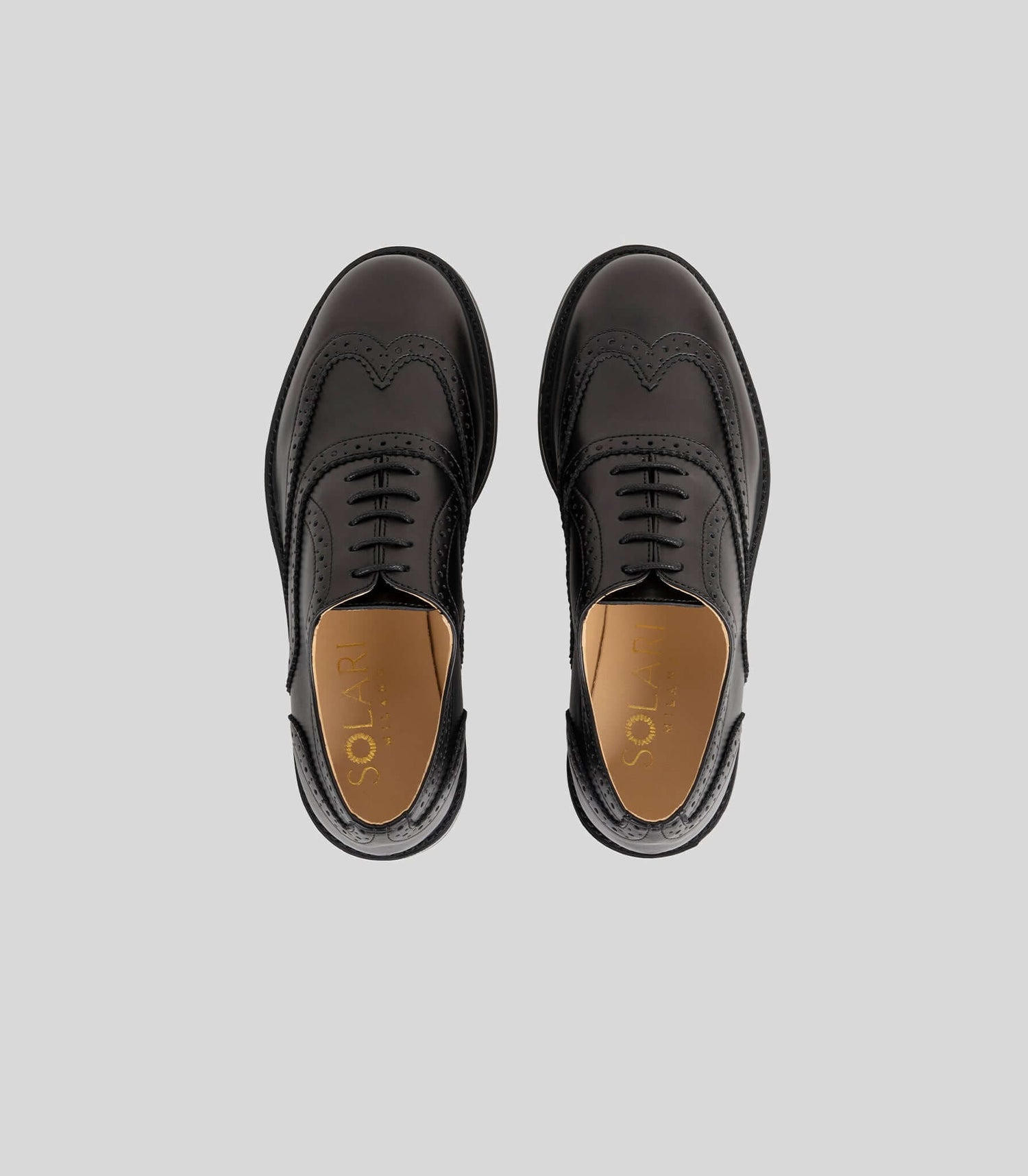 Vegan Oxford Brogue - Woman, stylish black shoes with broguing detail, perfect for office or casual wear.