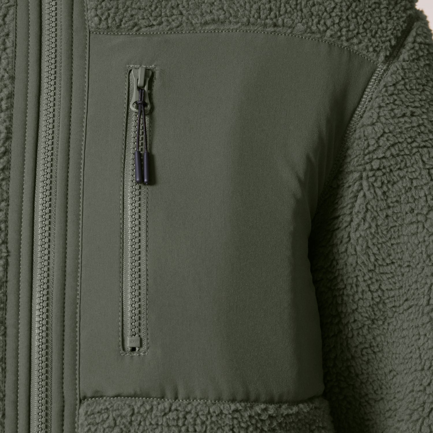 Close Up pf NEW WORLD GUARDIANS EARTH sherpa jacket in 100% recycled polyester, cozy sustainable unisex outerwear, 3 color options