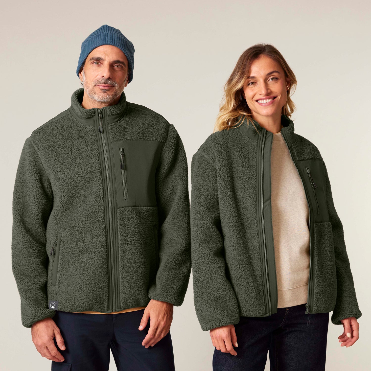 2 models wearing eco-friendly unisex sherpa jacket with polar fleece lining and contrast softshell panels, 3 color options