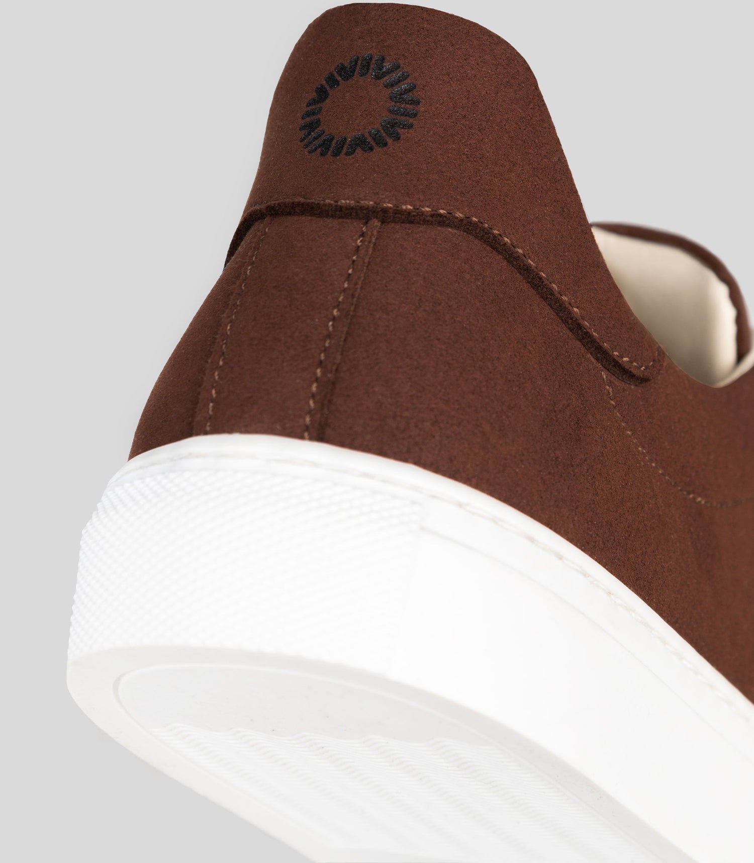 Close-up of the brown suede upper on Solari Milano's vegan sneaker