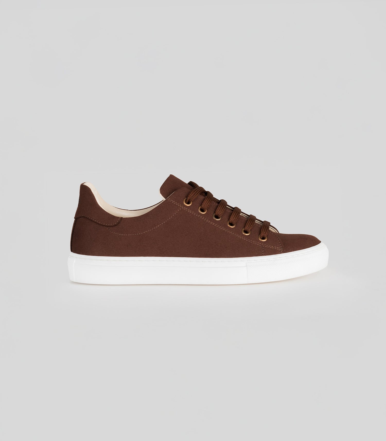 Brown vegan suede sneaker by Solari Milano on neutral background