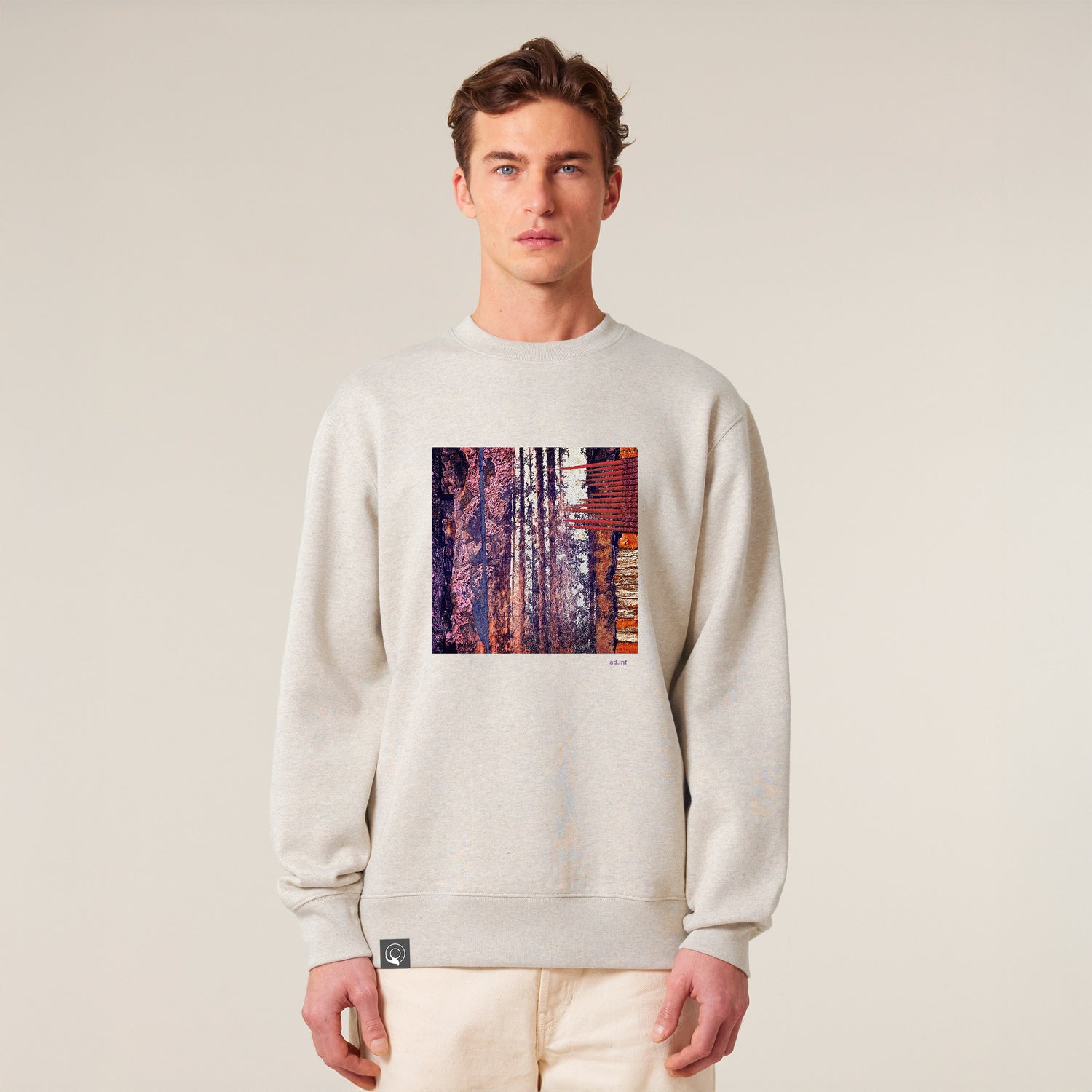 Male model wearing an eco heather sweater with a red art print, made from 100% organic cotton – sustainable and ethically made fashion by New World Guardians.