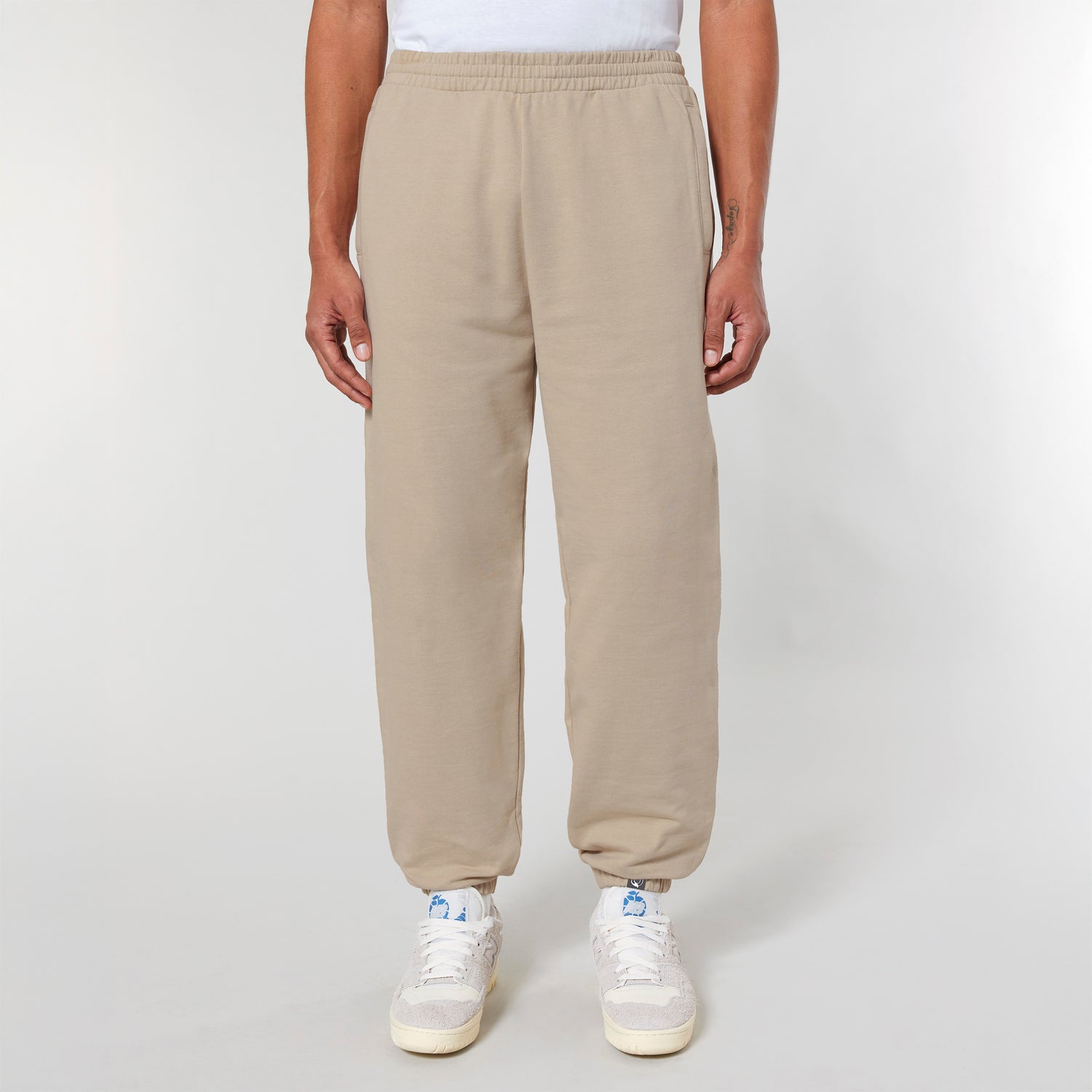Beige ethical sweatpants in organic cotton with waistband, drawstrings and patch pocket, sustainable style, 5 colors