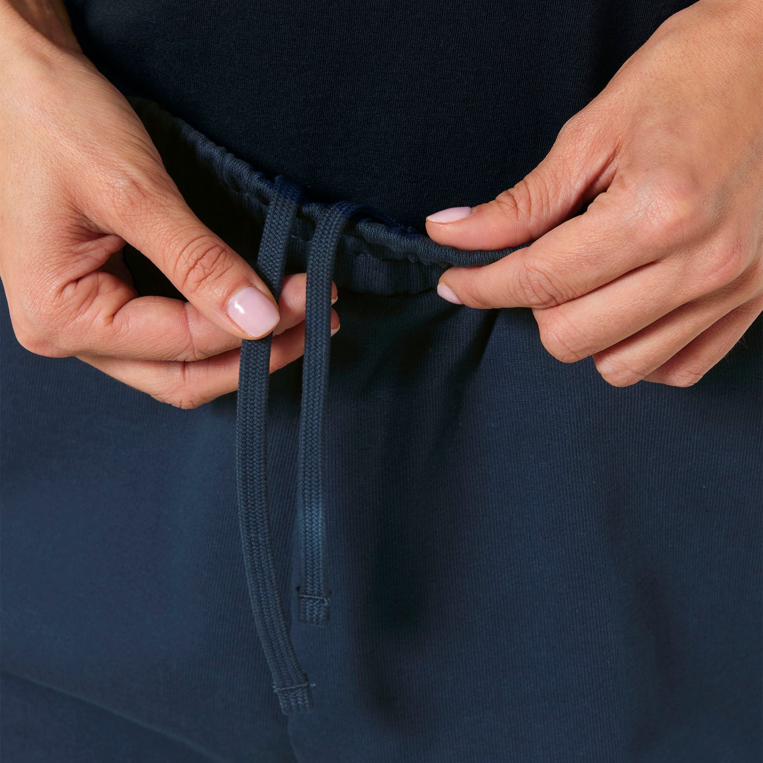 Close Up of minimalist unisex sweatpants crafted from organic carded cotton, breathable and durable, 5 color variations
