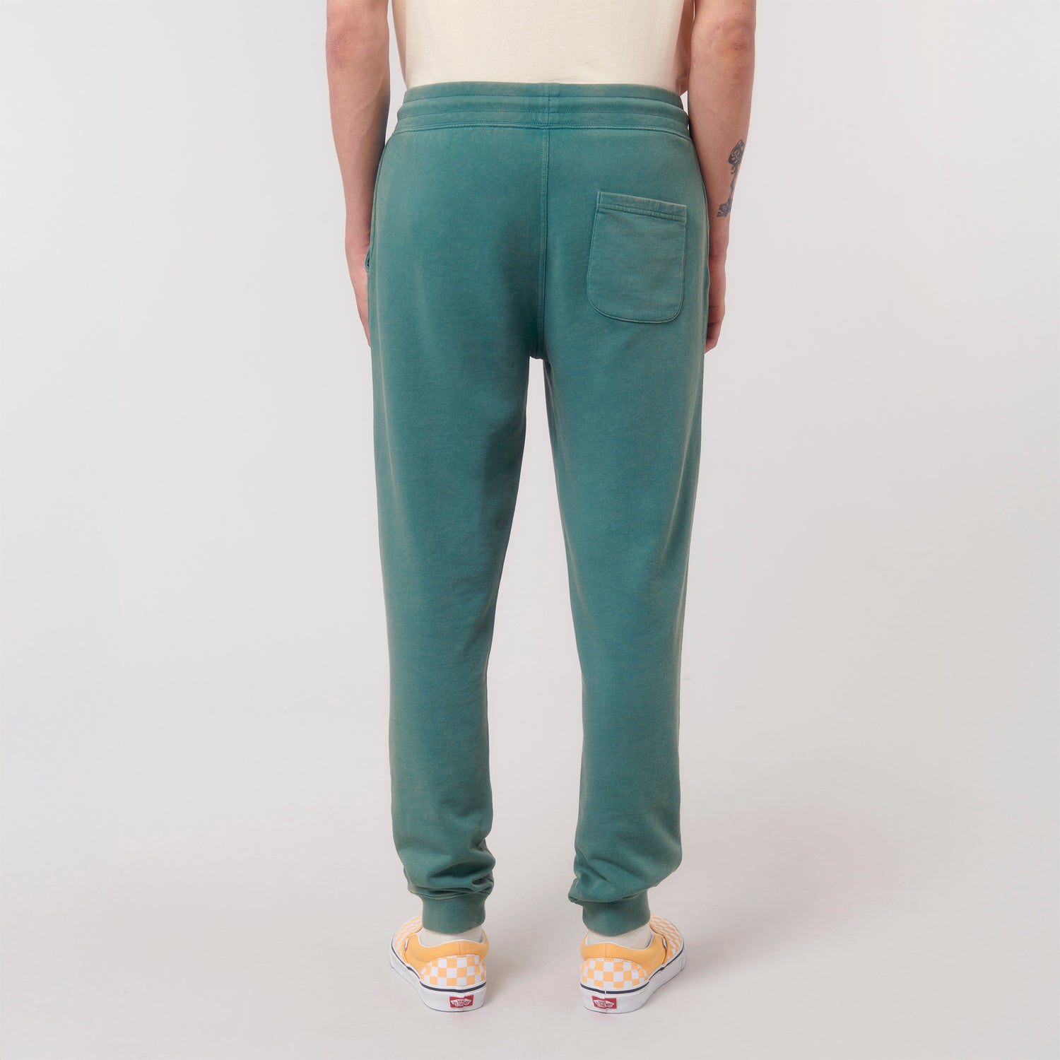 Back view organic cotton joggers with ribbed cuffs, waistband, and metal-tipped drawstrings, vintage washed look, 5 colors