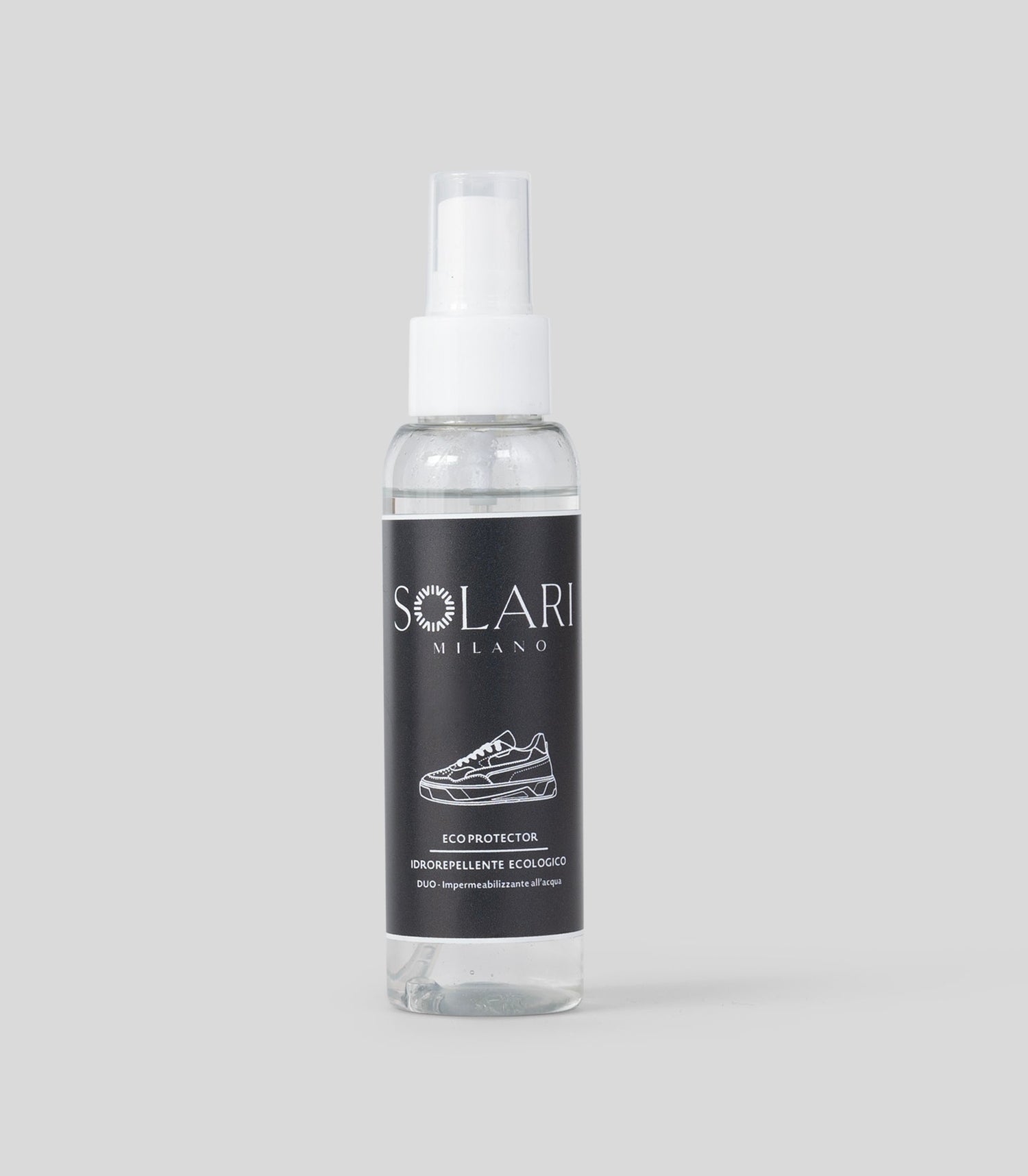 Shoe care - Clear spray bottle with black Solari Milano label on a light gray background