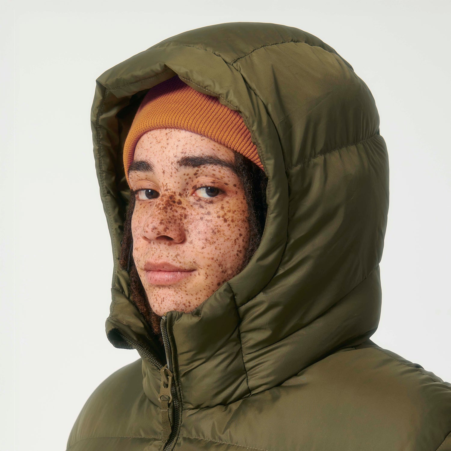 Close-Up of Guardian puffer jacket by NEW WORLD GUARDIANS, warm sustainable outerwear, unisex, 4 colors available