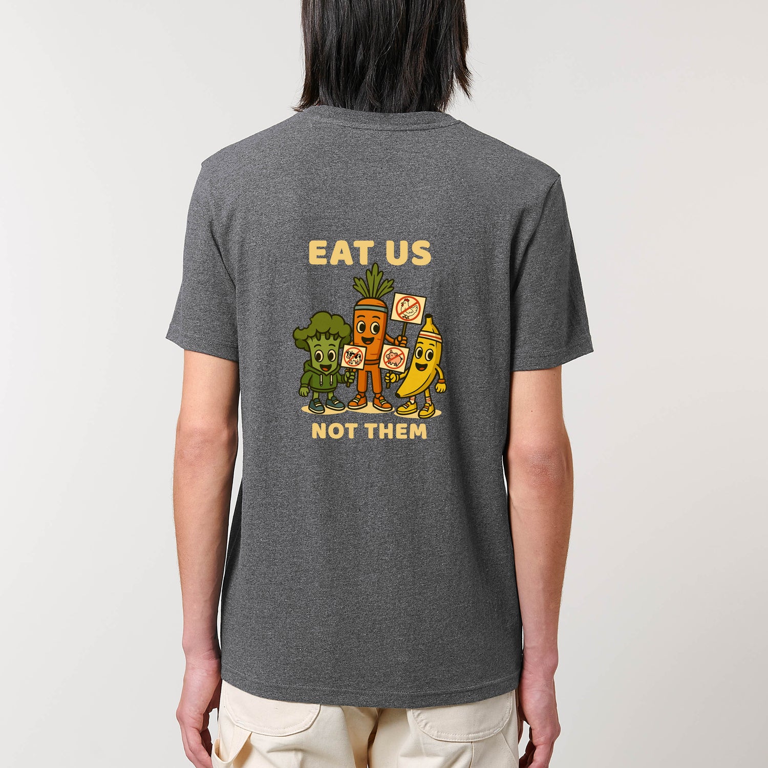 Back view of male model wearing a heather grey NEW WORLD GUARDIANS unisex vegan T-shirt featuring the full Roots for Our Future veggie squad in a comic-style back print with “Eat Us Not Them” slogan. Made from organic and recycled cotton. Conscious vegan fashion and sustainable streetwear with bold messaging.