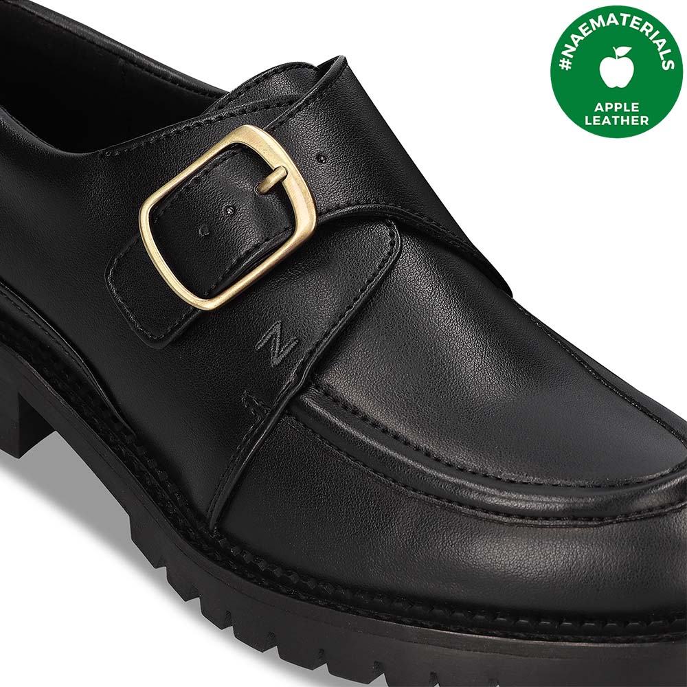 Apple Leather label of vegan materials on a women black loafer with golden buckle | NAE