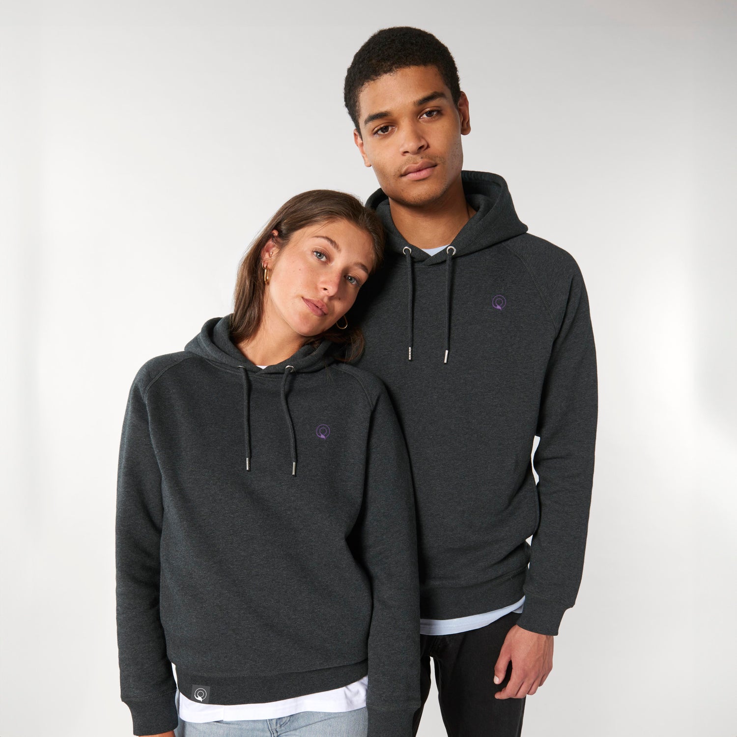Models wear grey vegan and cruelty-free hoodies in organic cotton blend, NEW WORLD GUARDIANS style, 11 colors