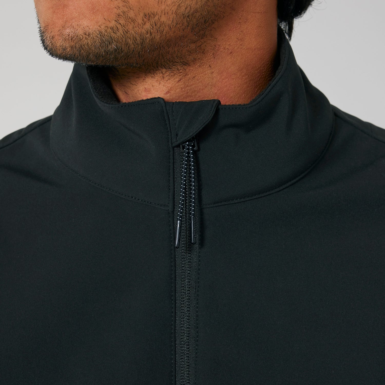 Close-Up of sustainable men’s outdoor jacket made from 94% recycled polyester and 6% elastane, NEW WORLD GUARDIANS design