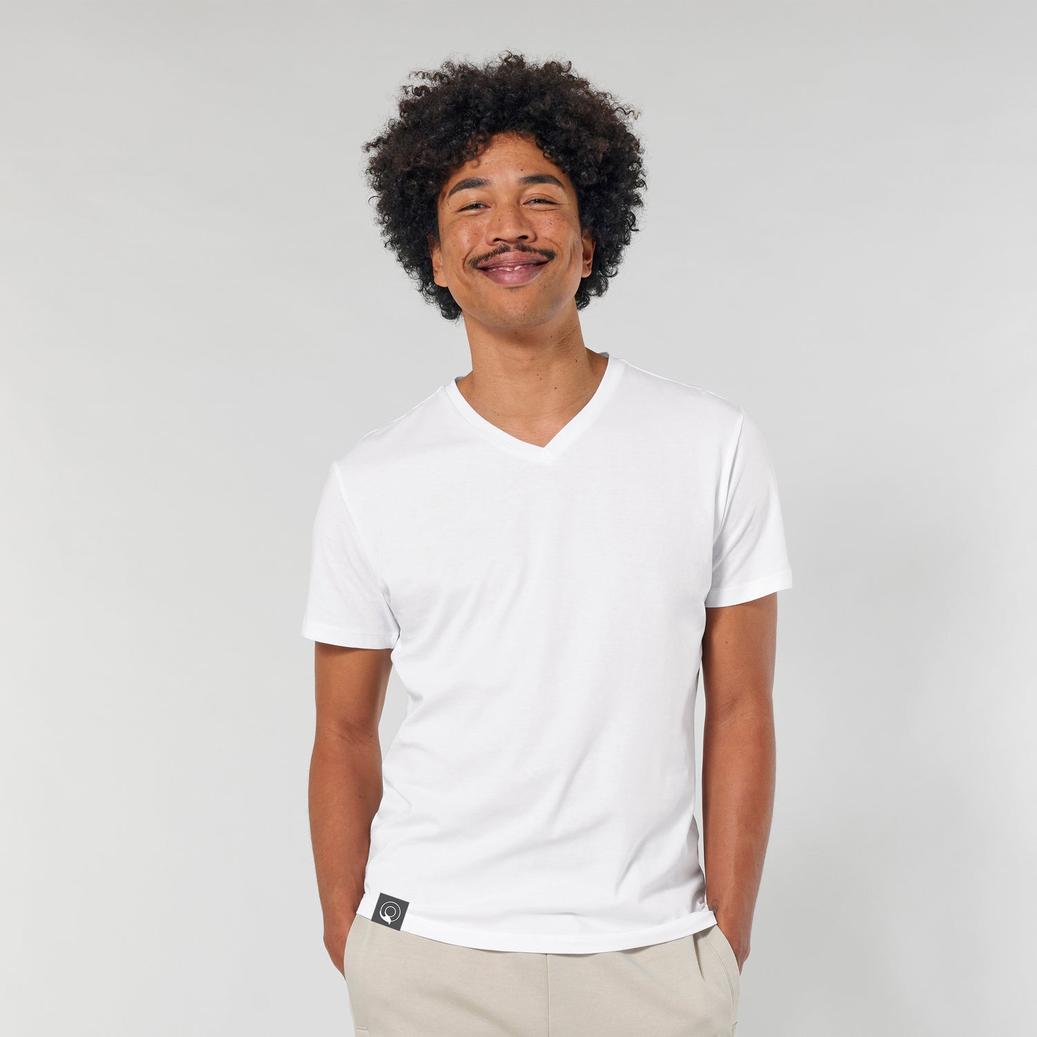 White eco-friendly men’s v-neck shirt crafted from GOTS-certified organic cotton, breathable and lightweight, 3 colors