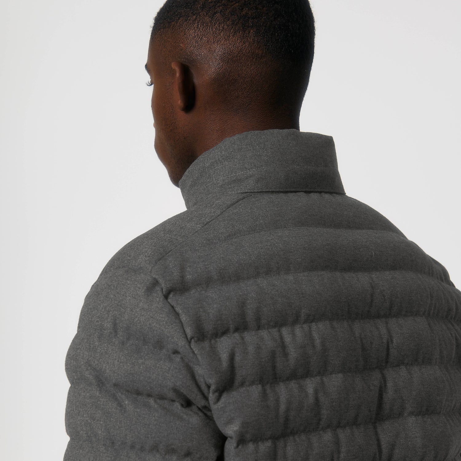 Close-Up of durable and warm men’s jacket with wool-like recycled polyester, tailored fit and detachable hood, 2 colors