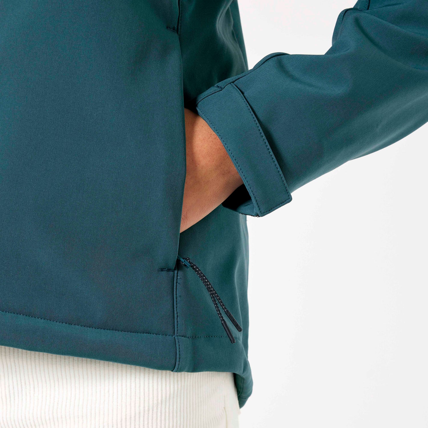 Close-Up of turquoise NEW WORLD GUARDIANS Explorer women’s softshell jacket in recycled polyester, sustainable outdoor wear, 4 color options