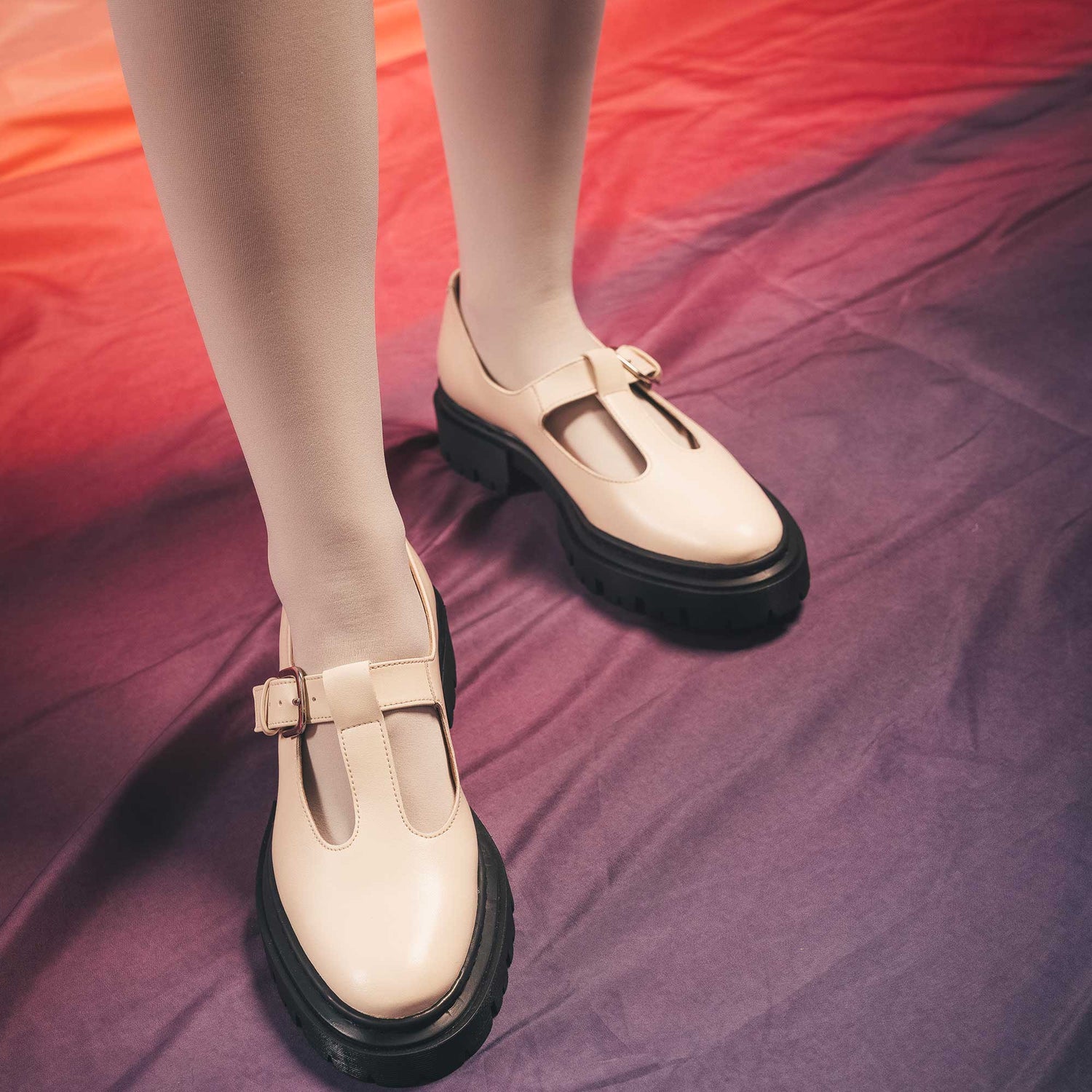 Women vegan white mary janes flats shoes with black sole wearing white stockings | NAE