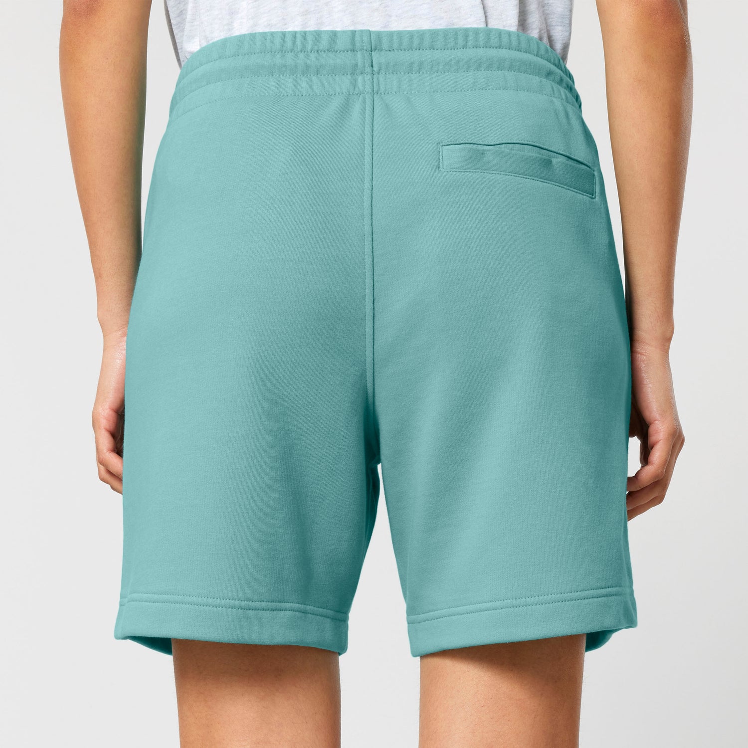 back view of ethical unisex shorts in organic cotton blend with side and back pockets, breathable and durable