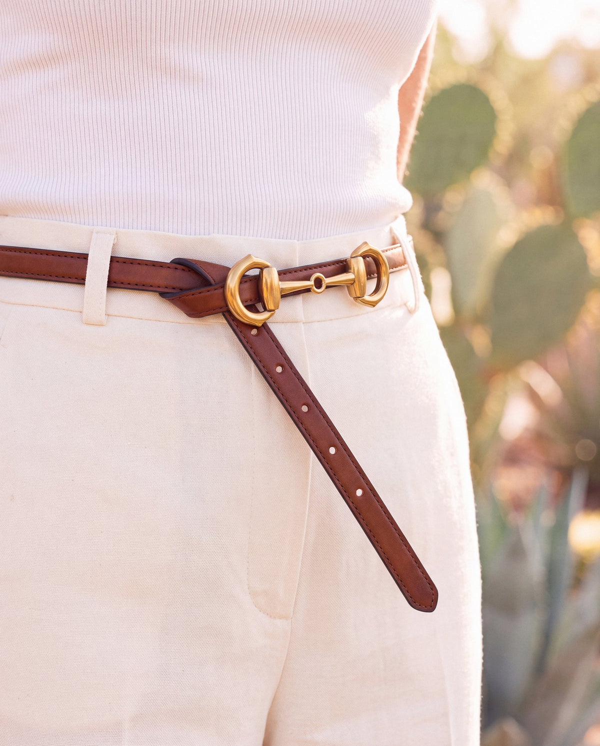 BISBAL Brown women's vegan belt in Desserto® cactus material – worn by a model