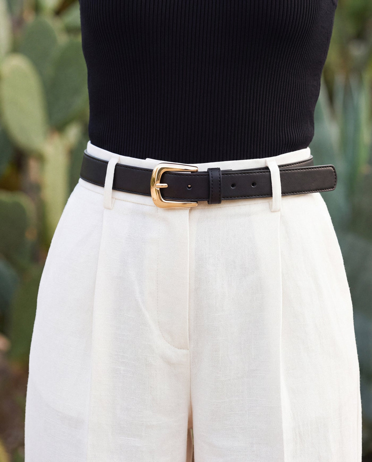 GARRIGA Black women's vegan belt in Desserto® cactus material – worn by a model