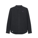 Front view of a garment-dyed black rock unisex worker shirt – sustainable and ethically made fashion by New World Guardians.