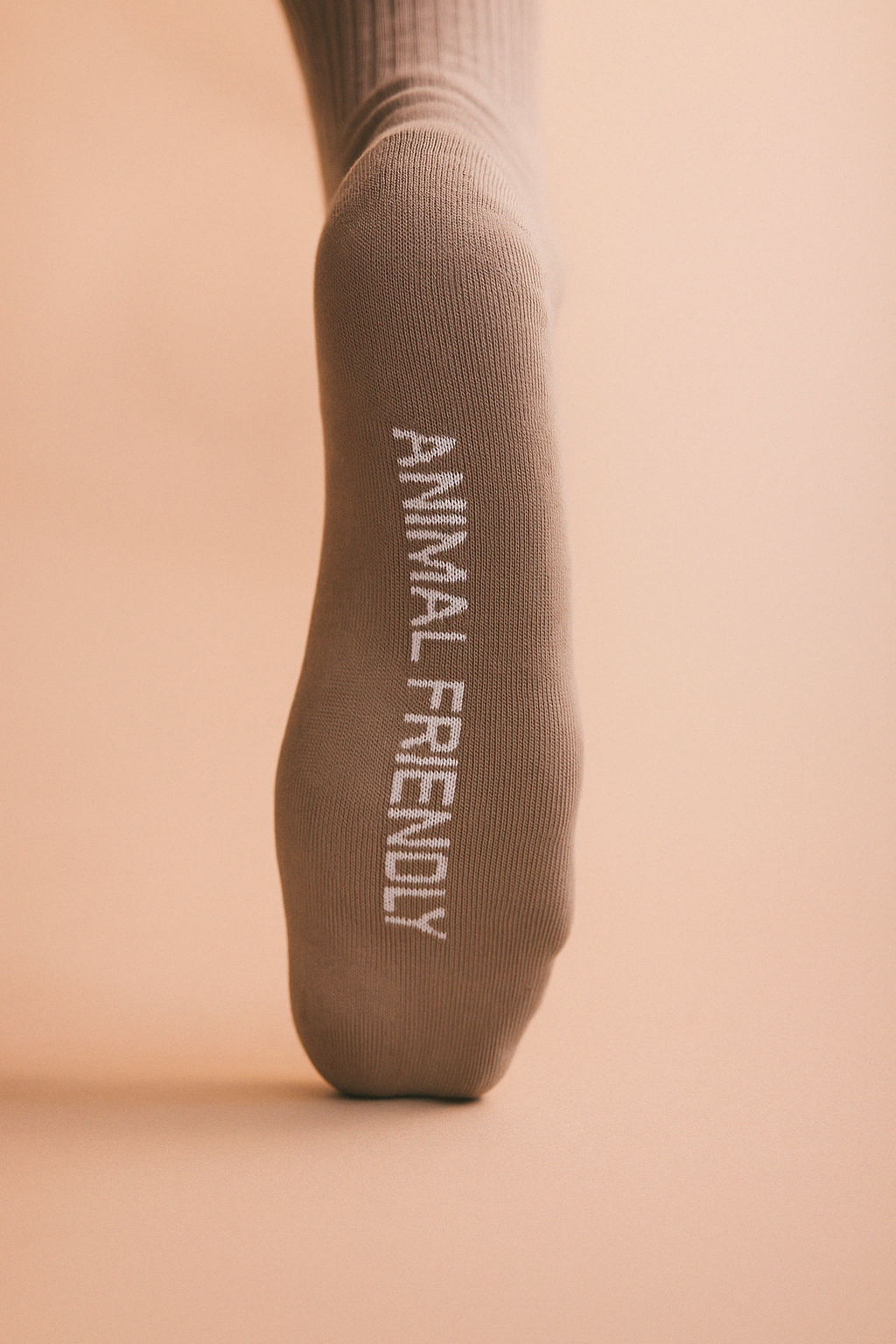 animal friendly sock footbed logo
