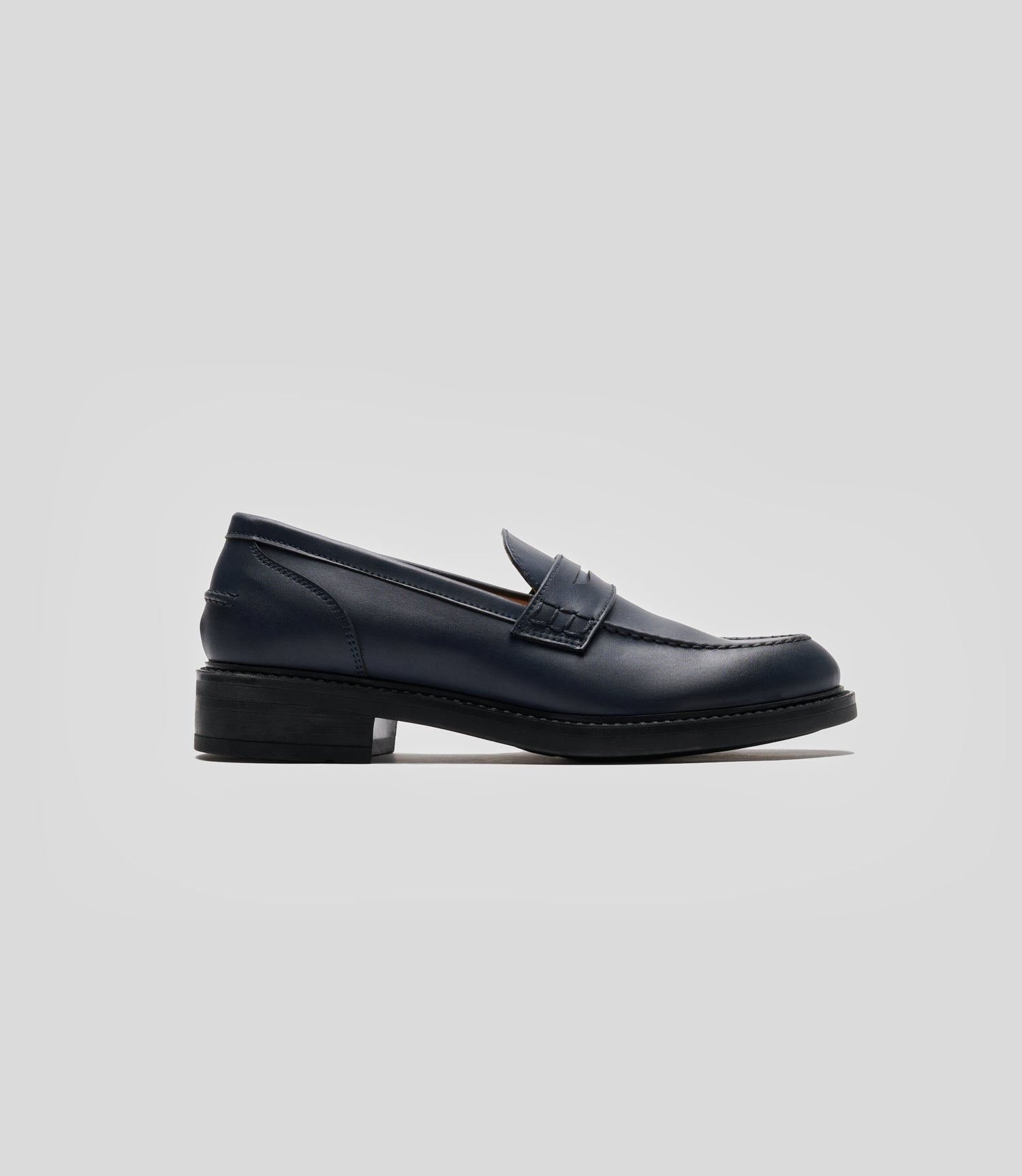 Navy blue vegan loafer for women by Solari Milano, three-quarter view