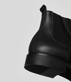 Vegan Chelsea Boot - Men showcasing the elegant design and craftsmanship with a focus on the boot's back and sole.