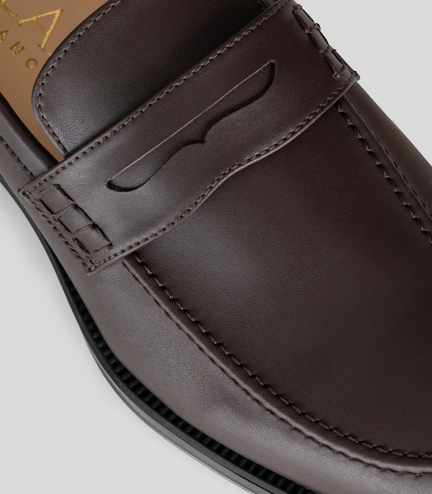 Close-up of the Vegan Loafer - Man showcasing the stylish design and U-shaped pattern on the upper.