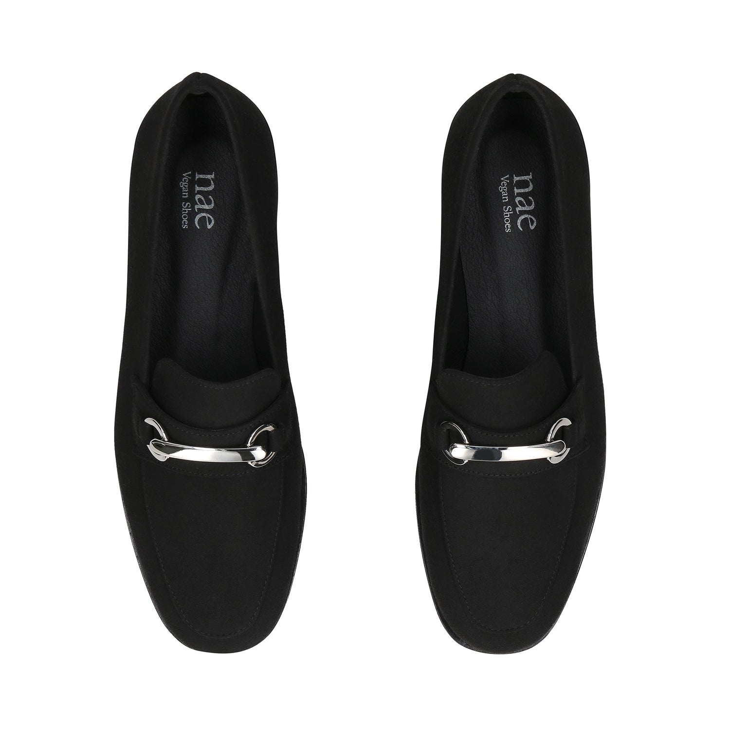 Black loafers with silver accents on a white background