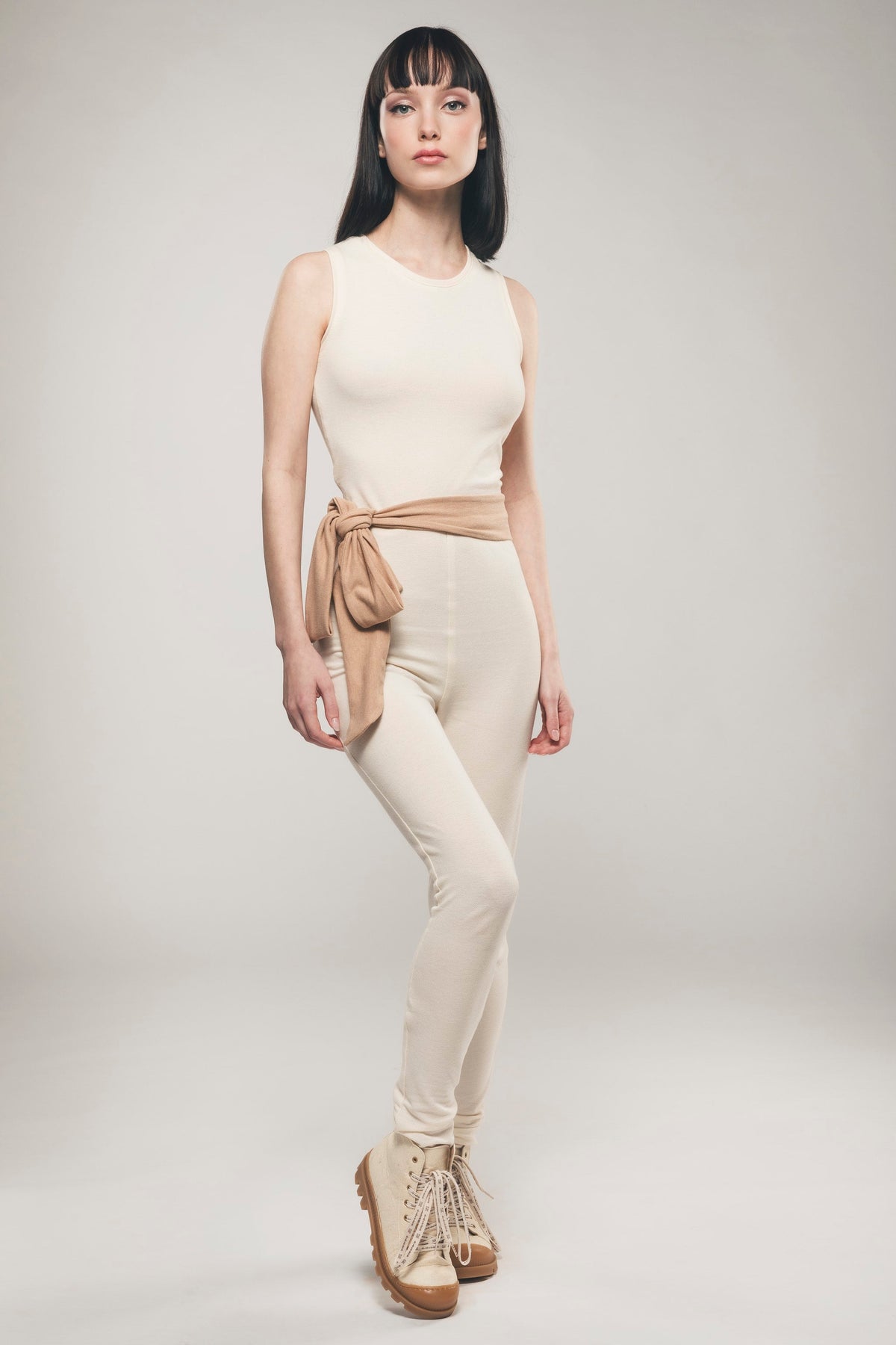 Bellamy ecru cotton piqué jumpsuit with contrast waist tie – front view