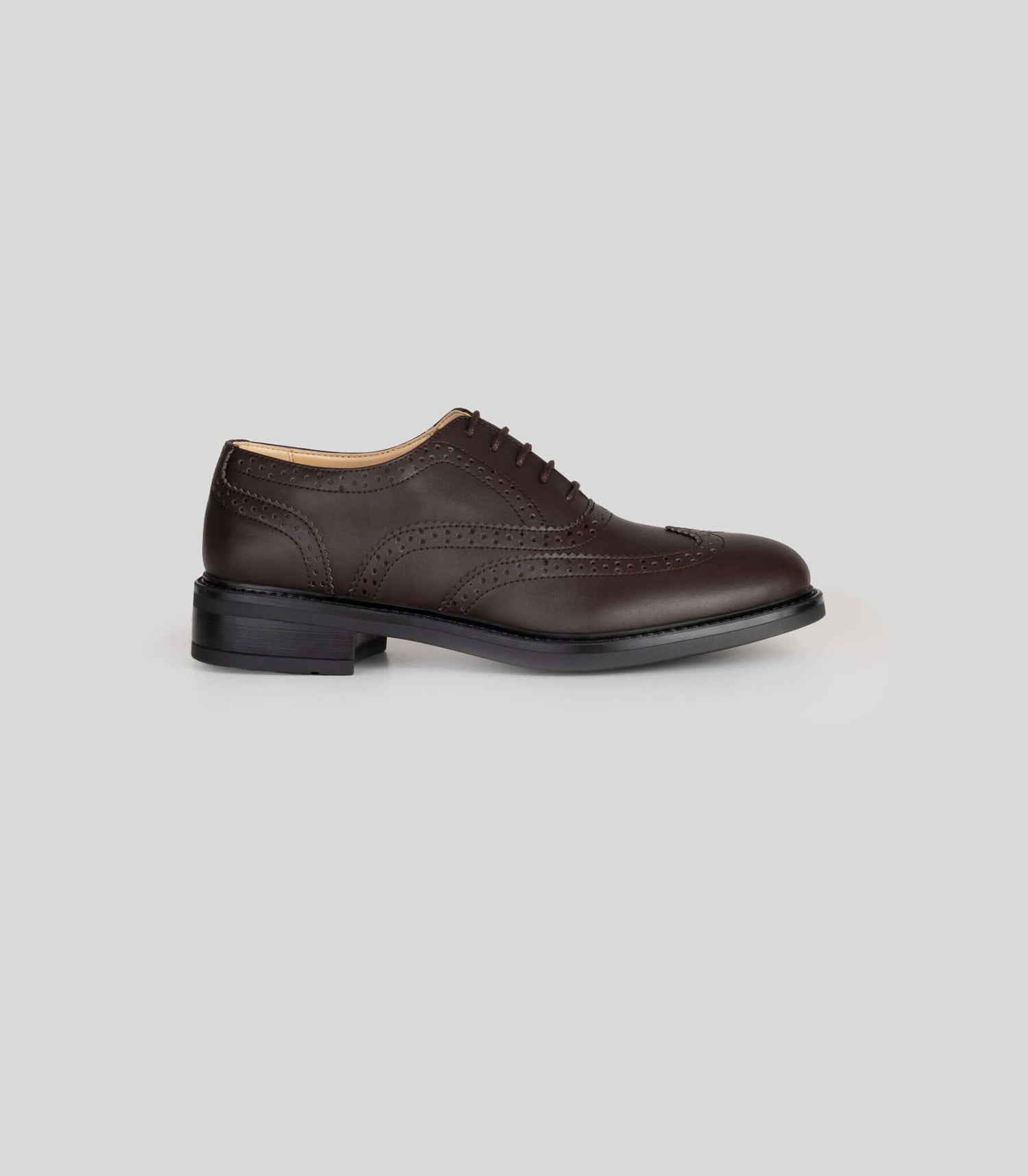 Vegan Oxford Brogue - Woman in dark brown with perforated broguing design, perfect for casual and office wear.