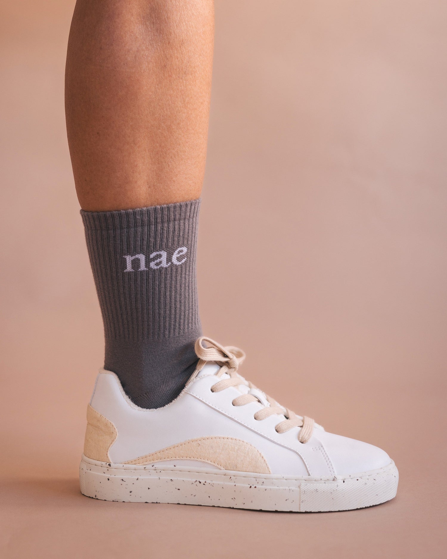 white trainers sustainable grey socks NAE