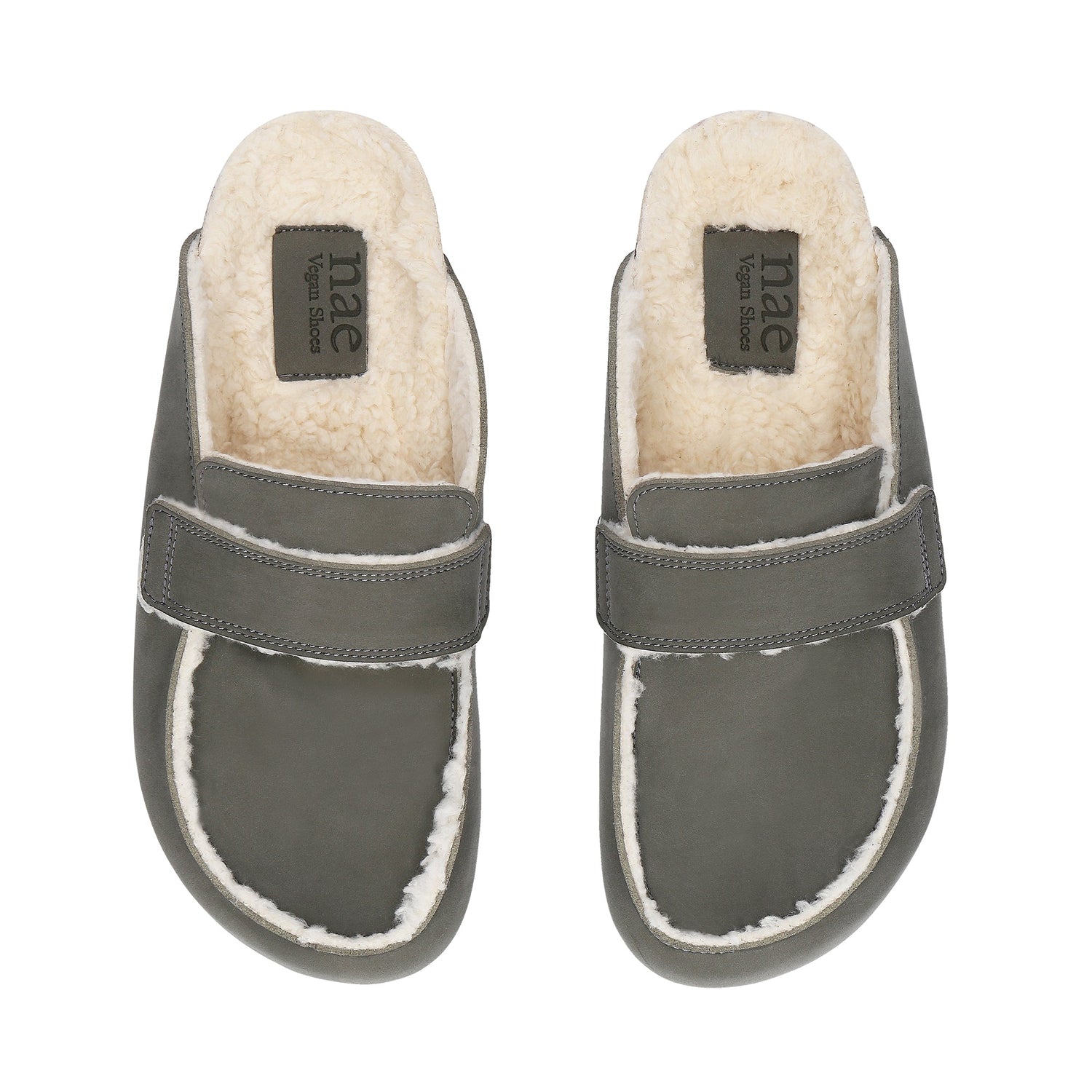 KOOD Green vegan clog worn with socks — unisex vegan clog in sage green with single strap detail, made in Spain by NAE Vegan Shoes