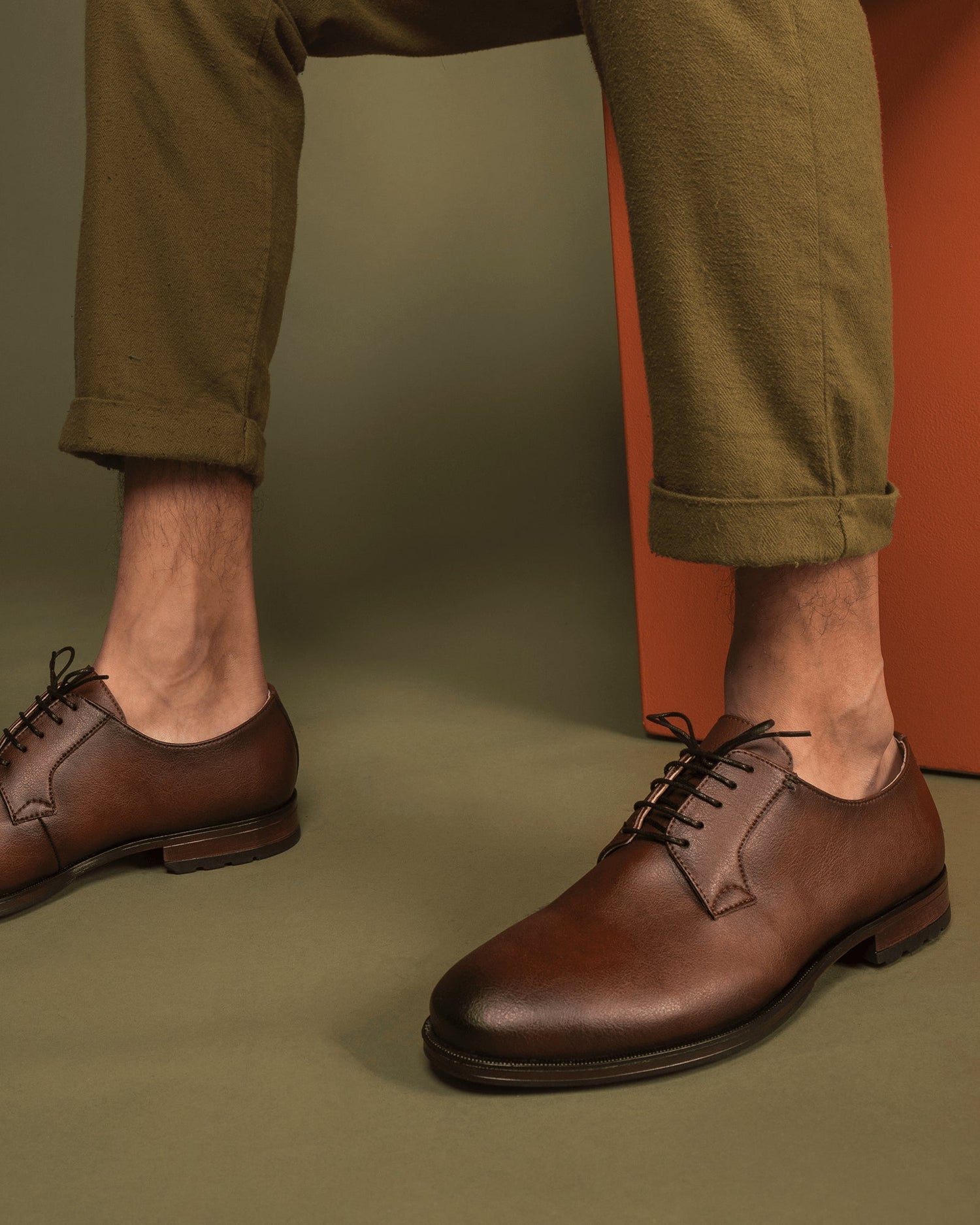 Men brown vegan shoes blucher made with sustainable microfibers wearing pants | NAE