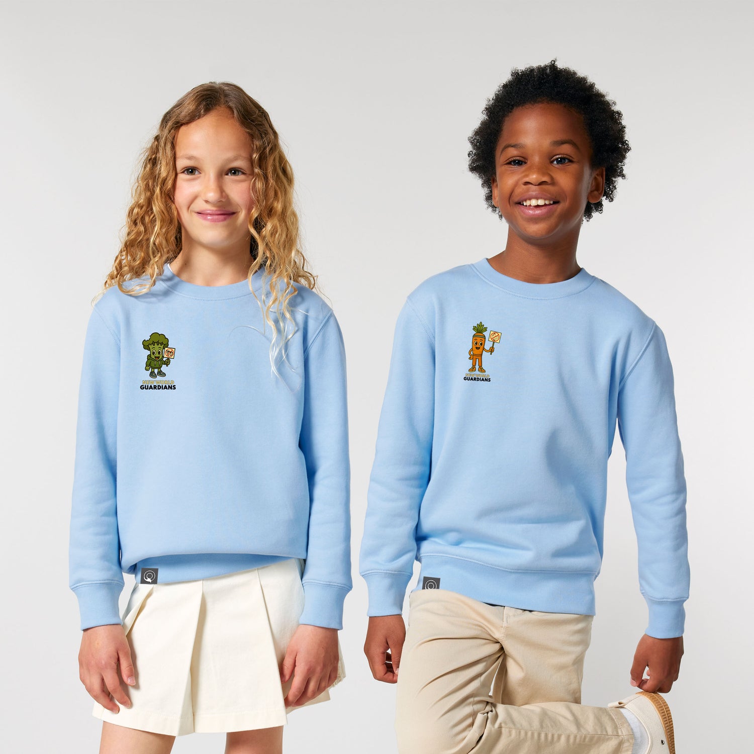 Roots for Our Future sweaters in light blue organic cotton with Steamy and Crunch vegan hero prints, modeled by children, ten colors