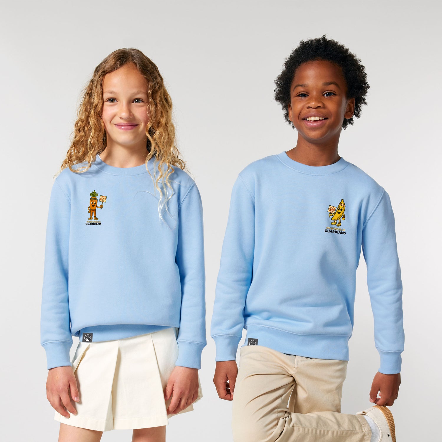 Two children wearing light blue organic cotton sweatshirts with plant hero prints, available in 10 colors
