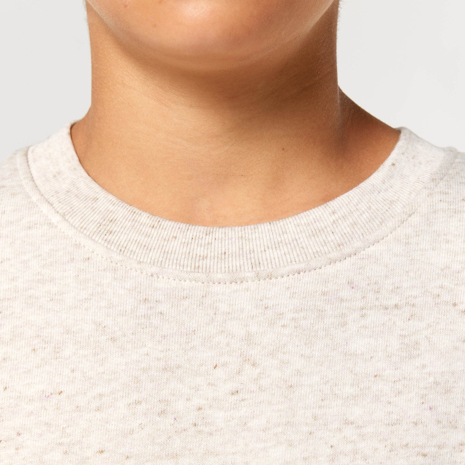 Sustainable fashion –  Close-Up of a organic cotton kids sweater in beige, 10 color options
