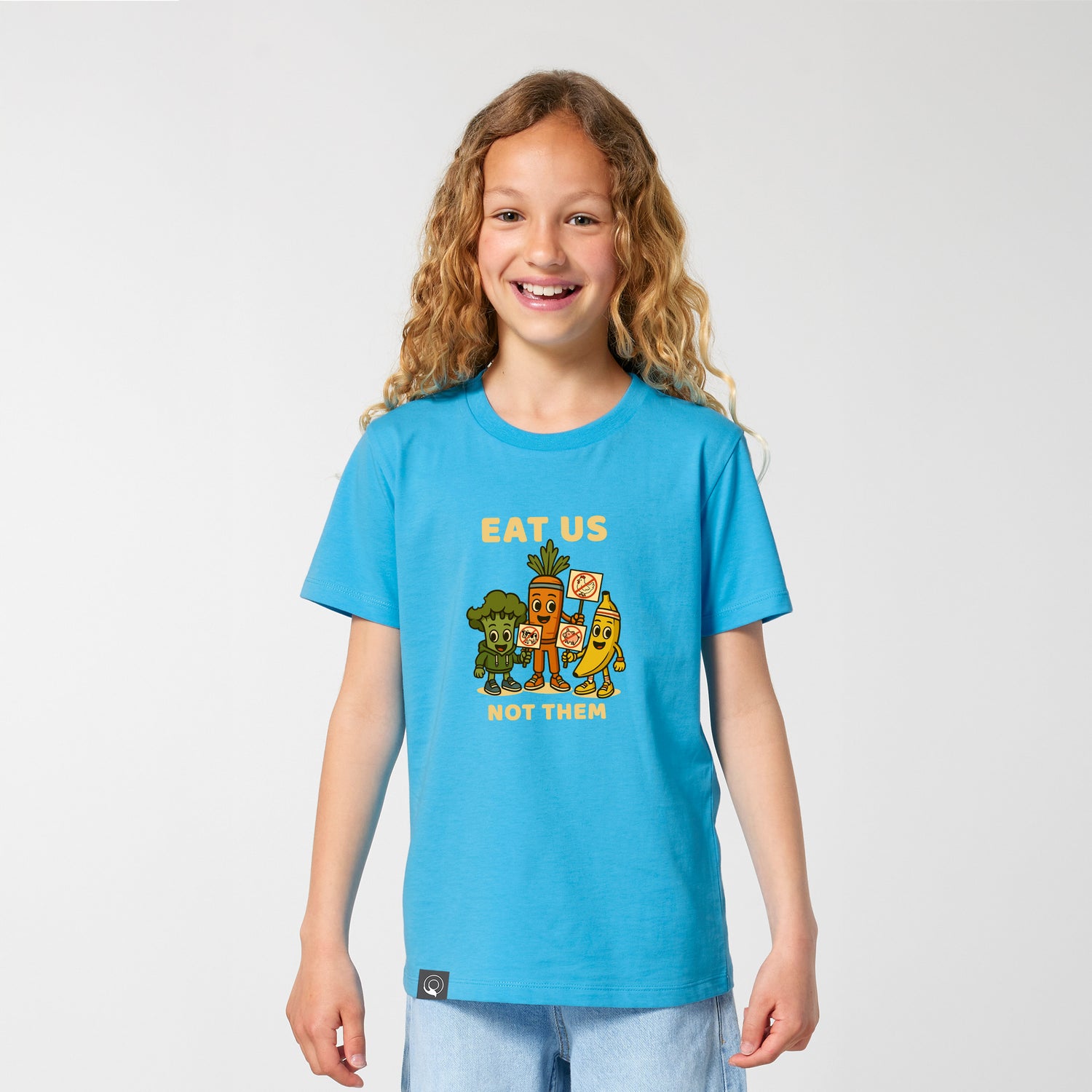 Roots for Our Future kids fashion – child in aqua blue vegan rebel t-shirt with Full NEW WORLD GUARDIANS Squad print
