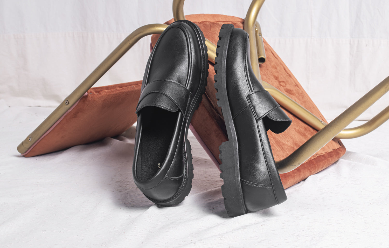 Black vegan loafers chair background | NAE Vegan Shoes