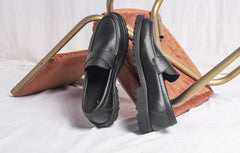Black vegan loafers chair background | NAE Vegan Shoes