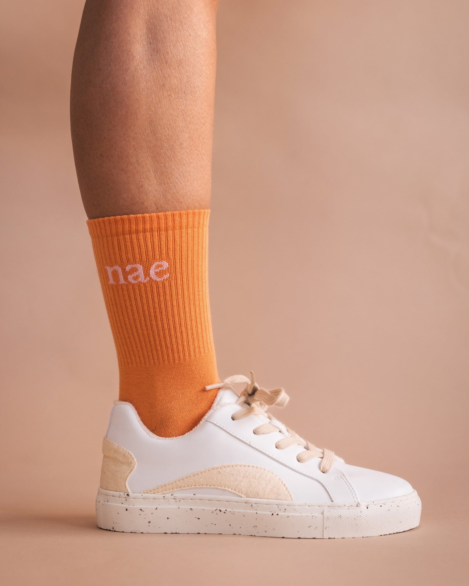 orange soc organic cotton with white trainers NAE