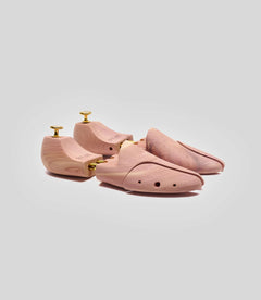 Premium cedar wood Shoe Trees displayed on a light background, showcasing their design and craftsmanship.