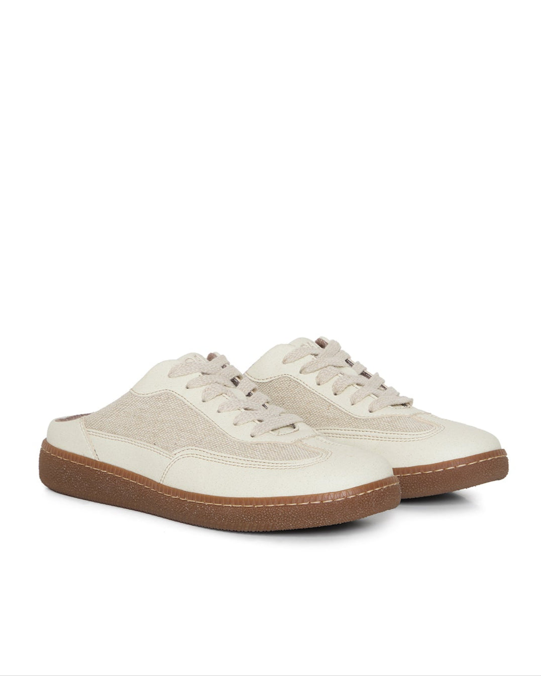 Pair of beige vegan and sustainable sneakers mules with brown soles from apple leather and linen