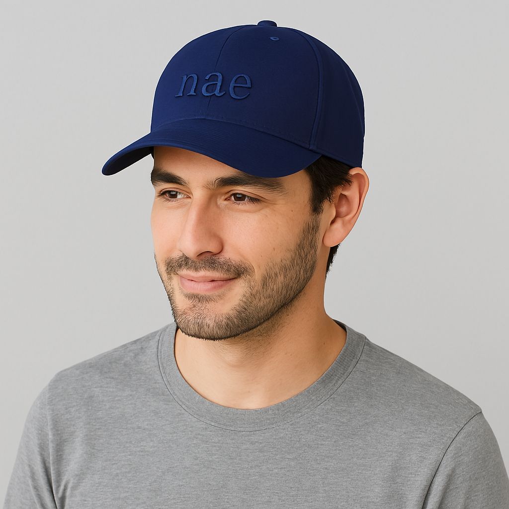 man wearing a blue cap of nae vegan shoes