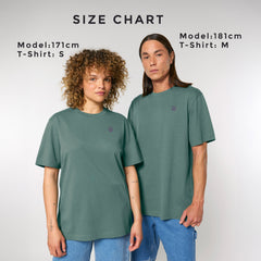 Two people wearing vegan green GUARDIAN  t-shirts with a size chart above them on a white background.
