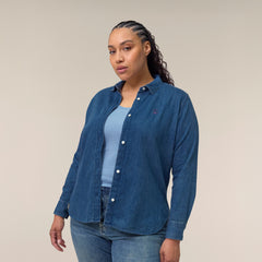 Models wearing the denim shirt for women in mid-wash – sustainable and ethically made fashion by New World Guardians