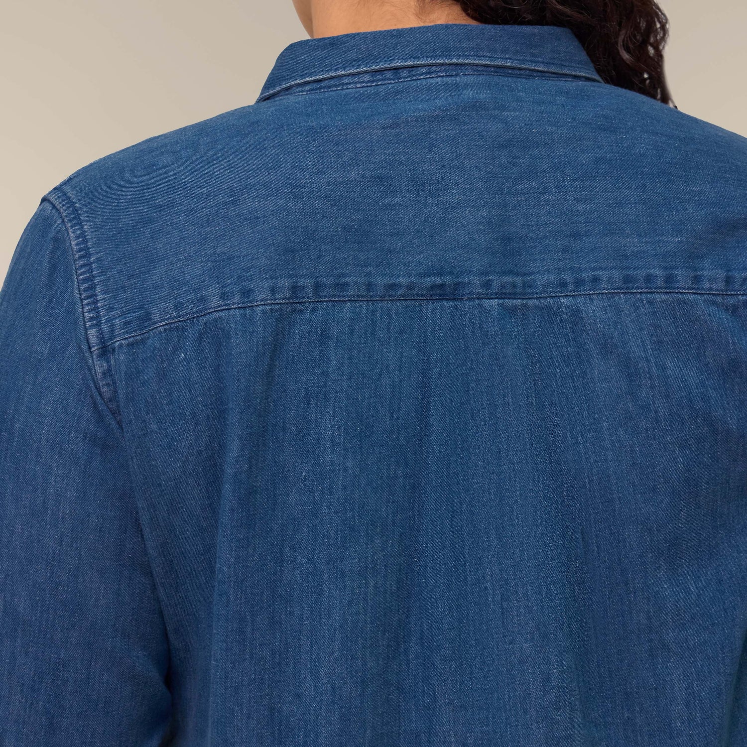 Models wearing the denim shirt in mid-wash – sustainable and ethically made fashion by New World Guardians