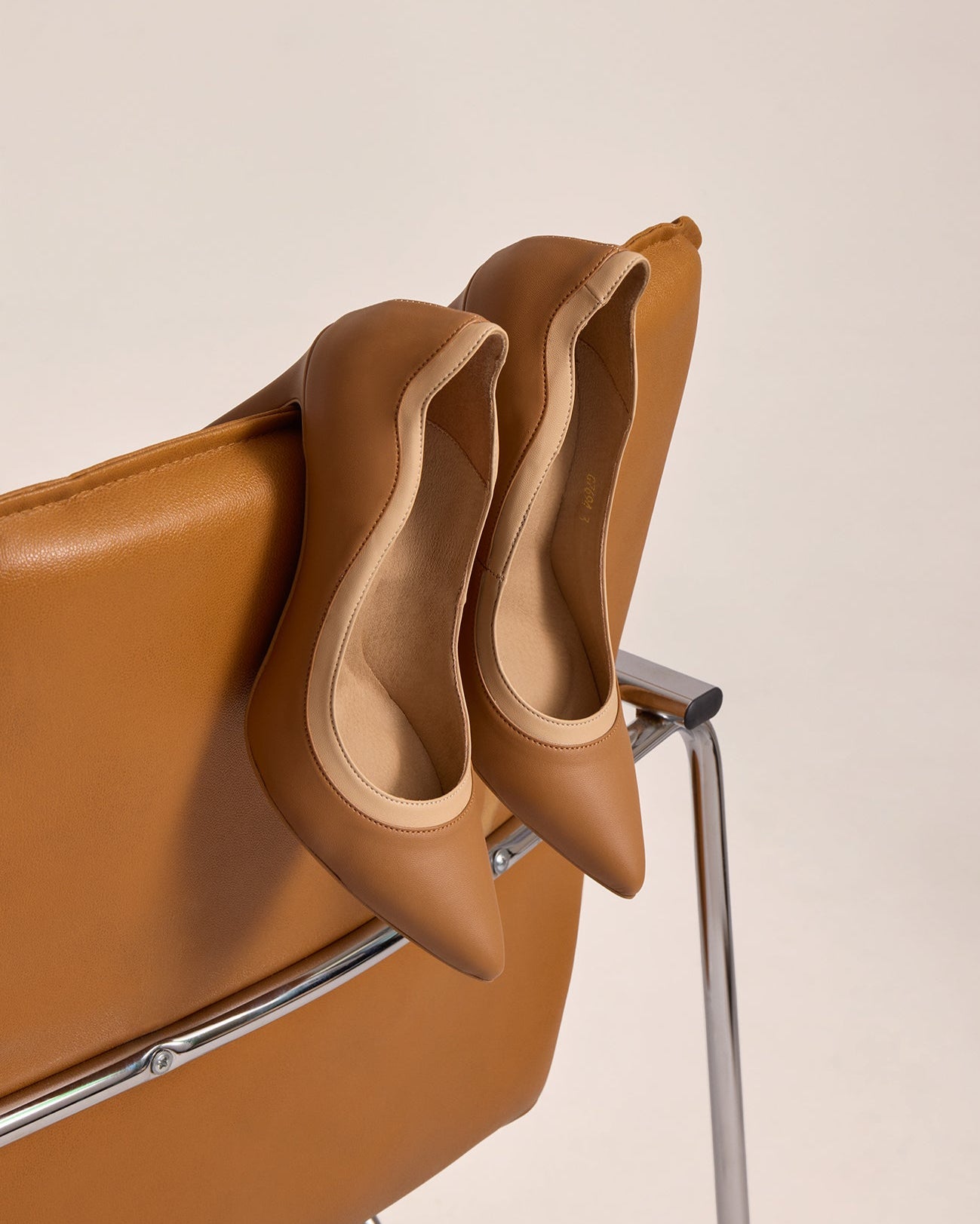 Brown sustainable high-heeled shoes in vegan mushroom leather.