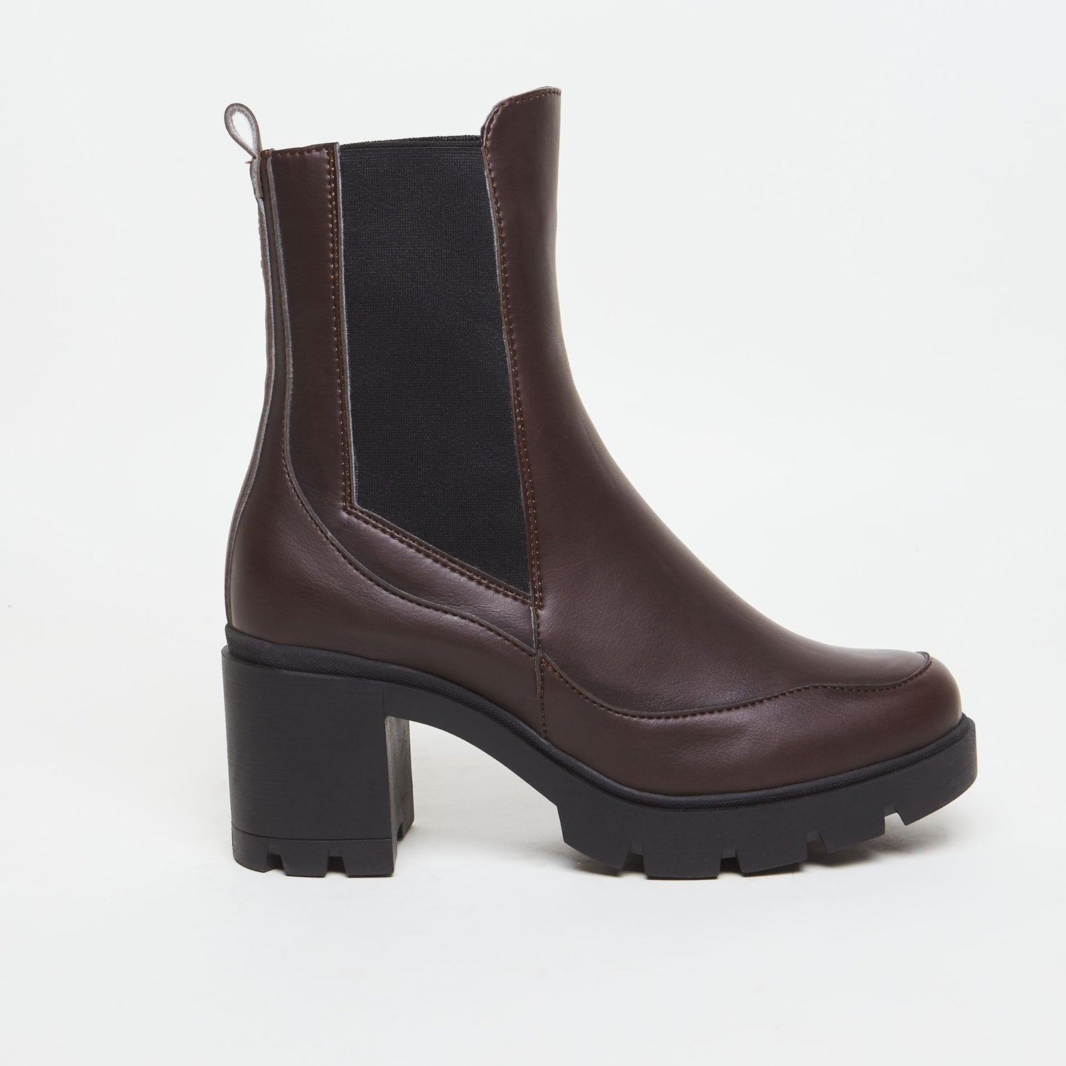 Brown vegan leather boot with a chunky heel on a white background